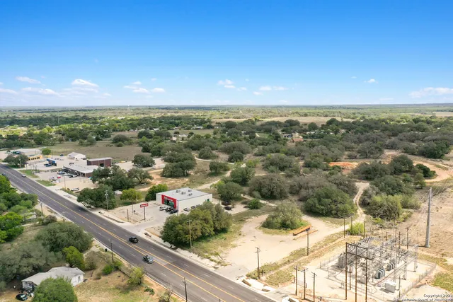 a view of a city with an ocean view