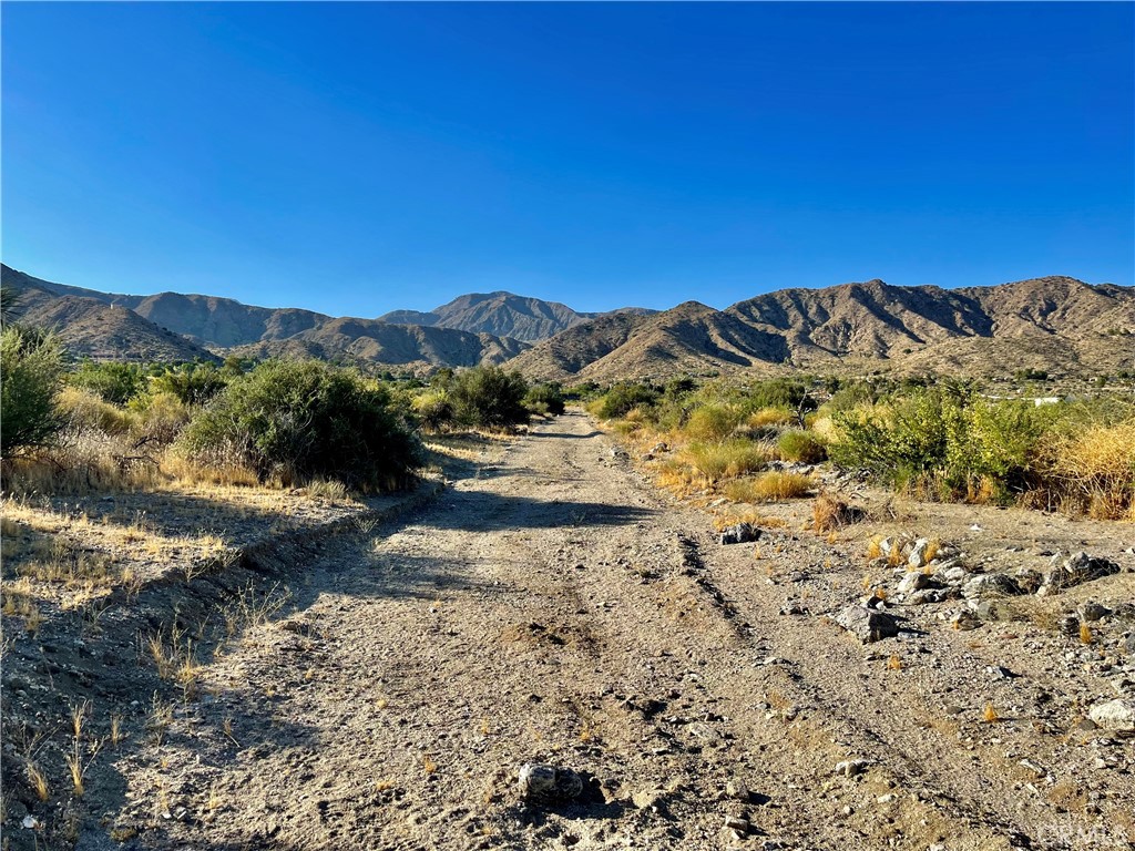 49200 Old Mill Road Morongo Valley, CA 92256 - Photo 12 of 20 a view of a road with a mountain in the background