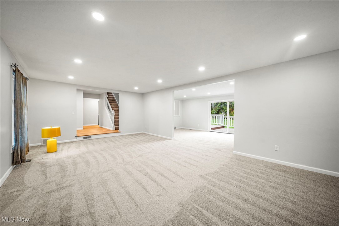 91 Paradise Road Painesville, OH 44077 - Photo 16 of 39 Below grade area with recessed lighting, carpet, and stairs