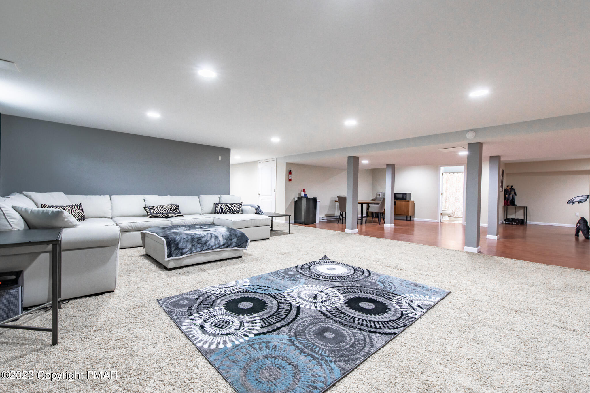 353 Great Bear Way Road East Stroudsburg, PA 18302 - Photo 62 of 87 a living room with furniture and a rug
