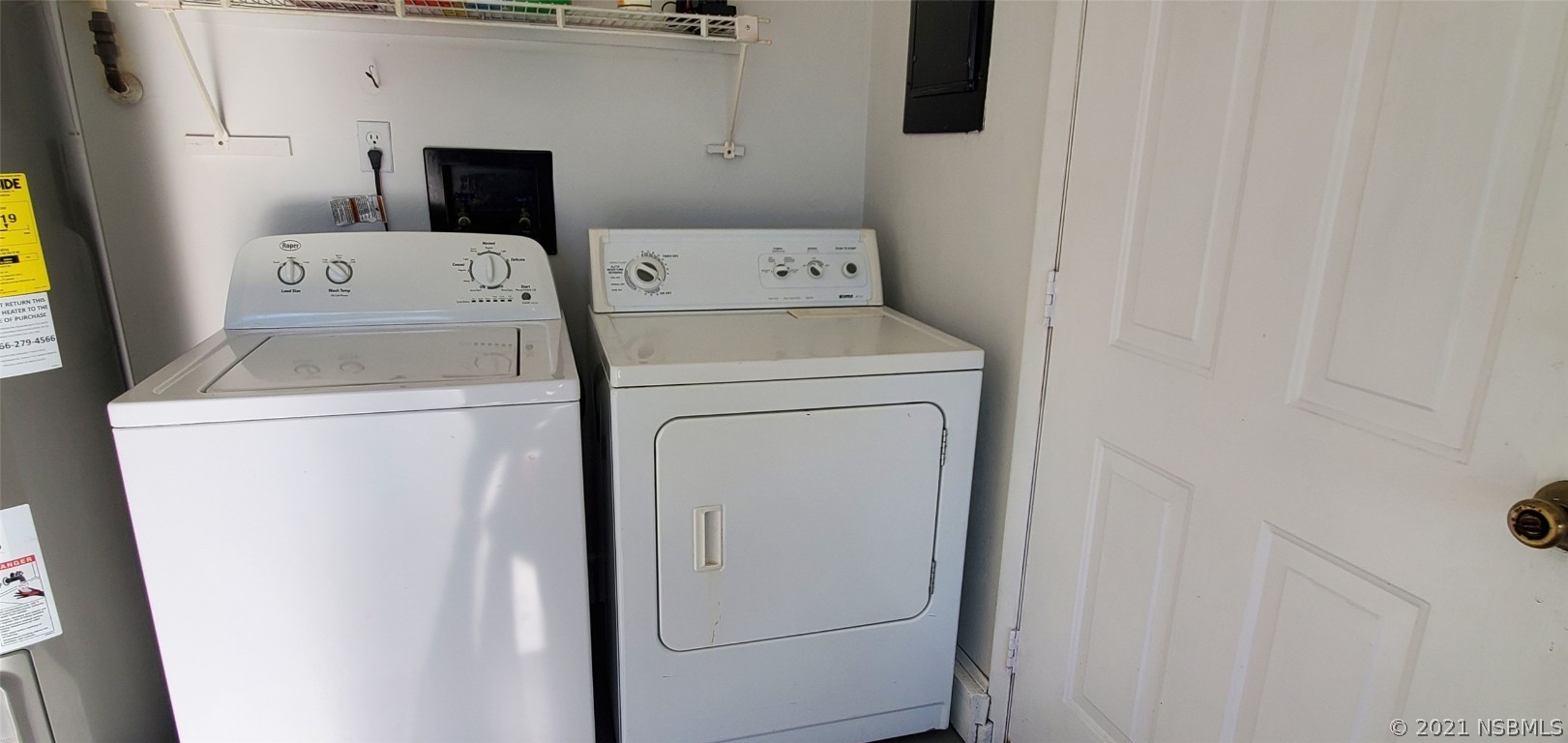 2219 Umbrella Tree Drive Edgewater, FL 32141 - Photo 13 of 45 a utility room with dryer and washer