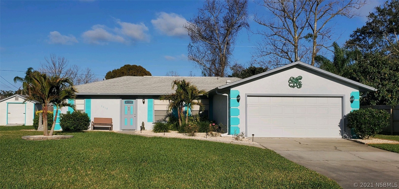 2219 Umbrella Tree Drive Edgewater, FL 32141 - Photo 18 of 45 a front view of house with yard and green space