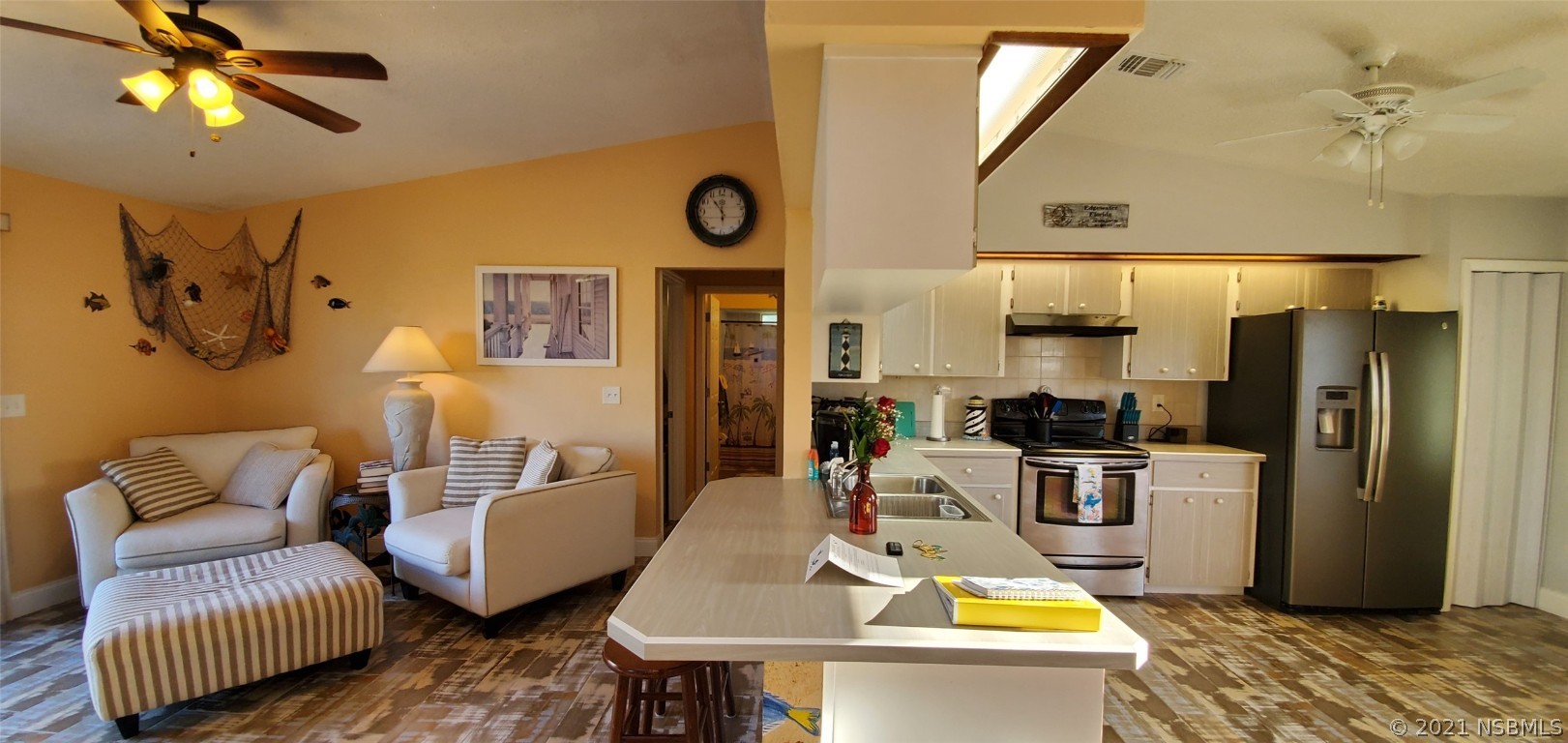 2219 Umbrella Tree Drive Edgewater, FL 32141 - Photo 30 of 45 a living room with furniture and a window
