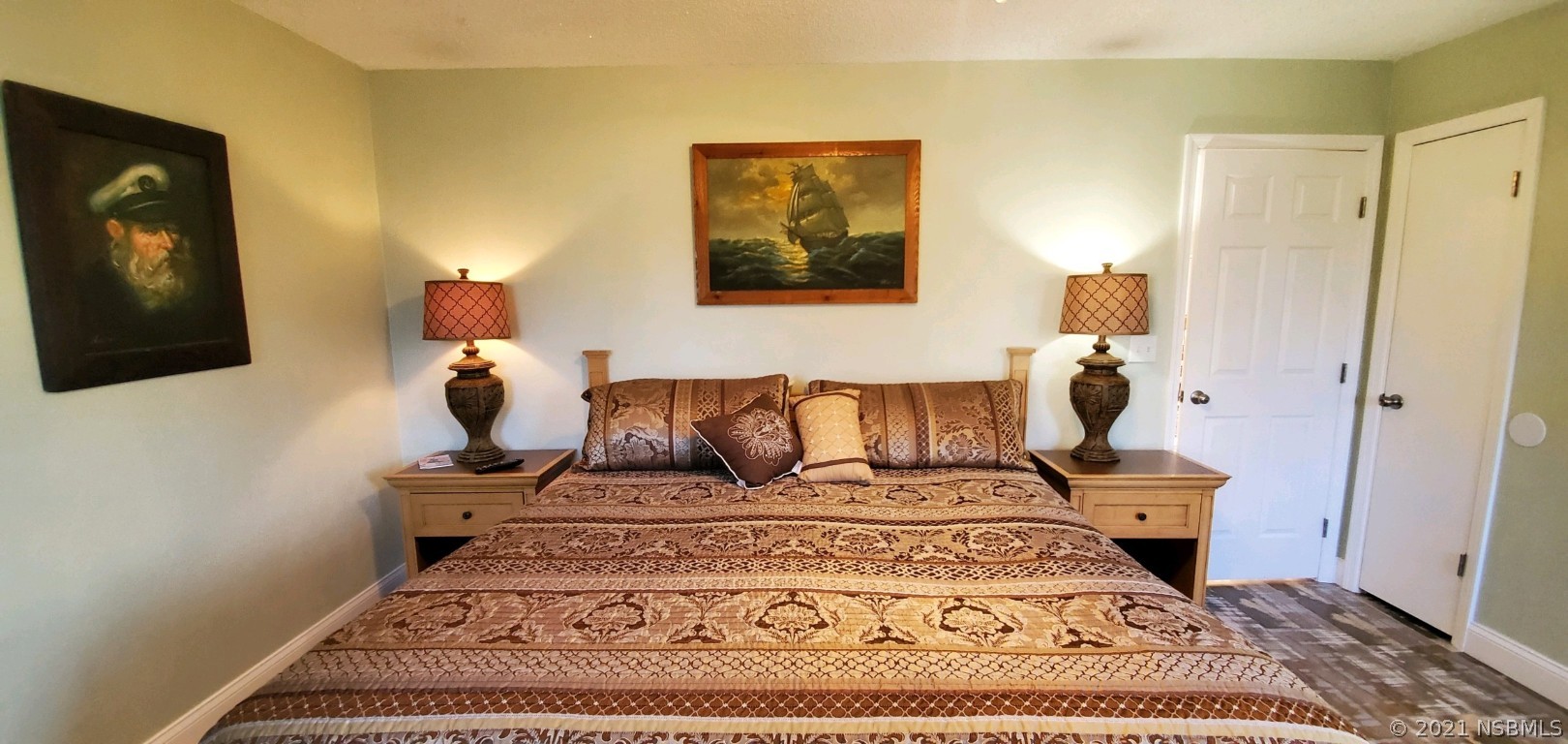 2219 Umbrella Tree Drive Edgewater, FL 32141 - Photo 34 of 45 a living room with a couch and a flat screen tv