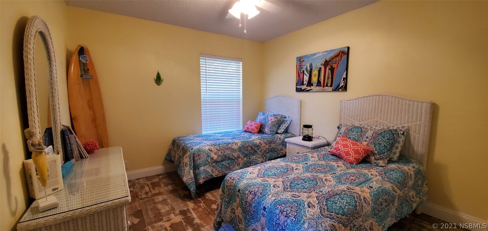 2219 Umbrella Tree Drive Edgewater, FL 32141 - Photo 40 of 45 a bedroom with two beds and a chandelier