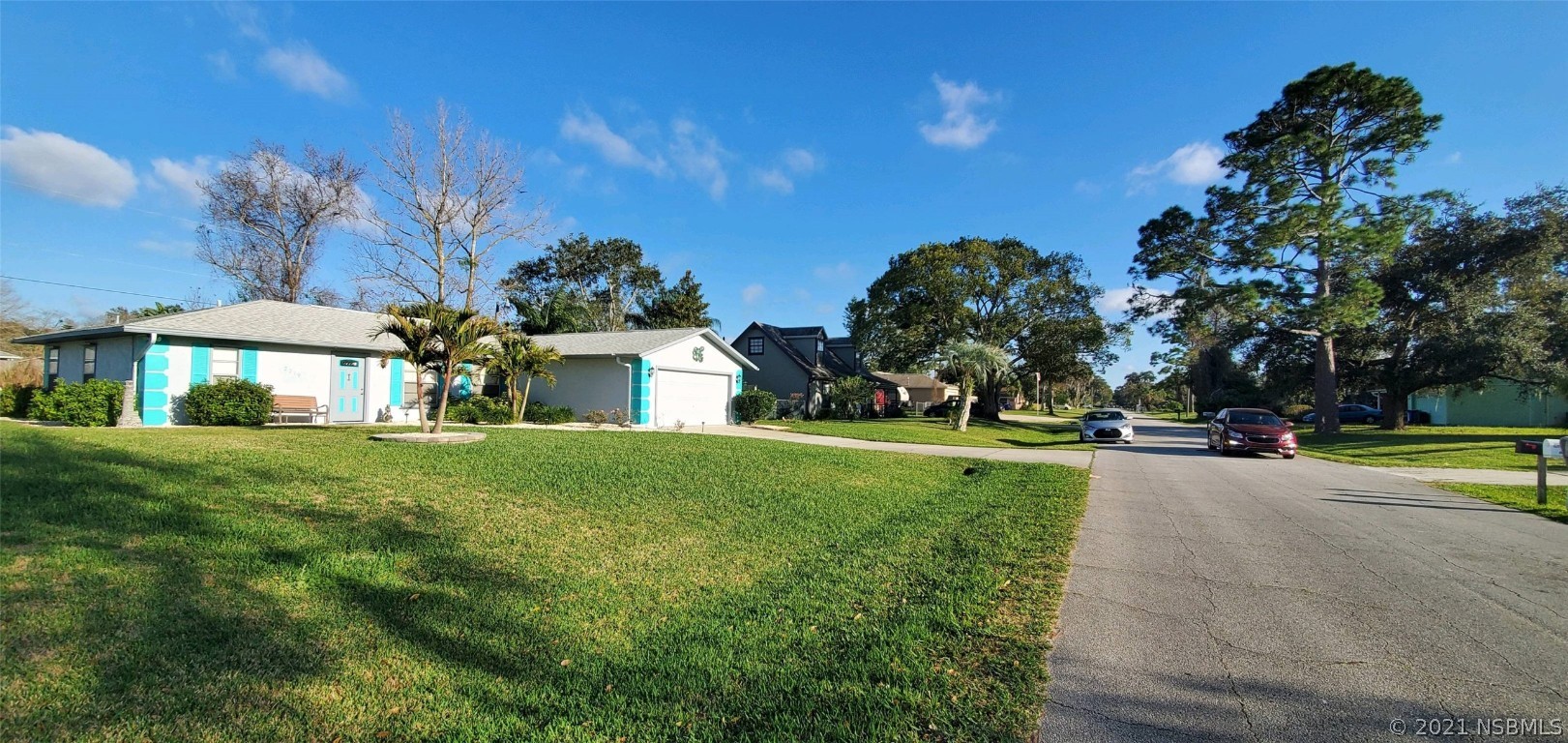 2219 Umbrella Tree Drive Edgewater, FL 32141 - Photo 4 of 45 a view of a house with a yard and a garden