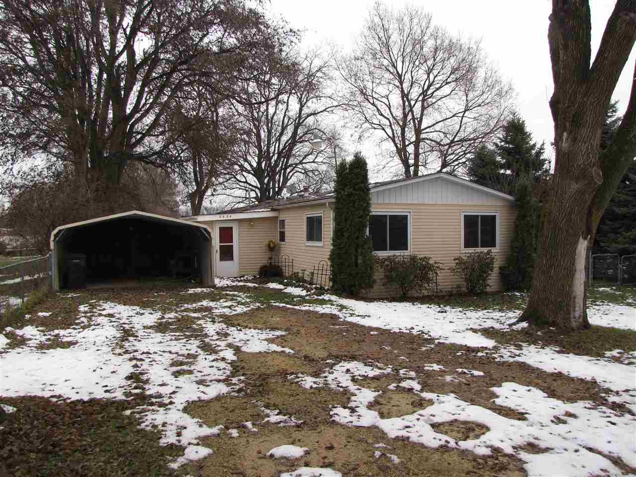 3634 Rotary Road Rockford, IL 61109 - Photo 1 of 18 a view of a house with a yard