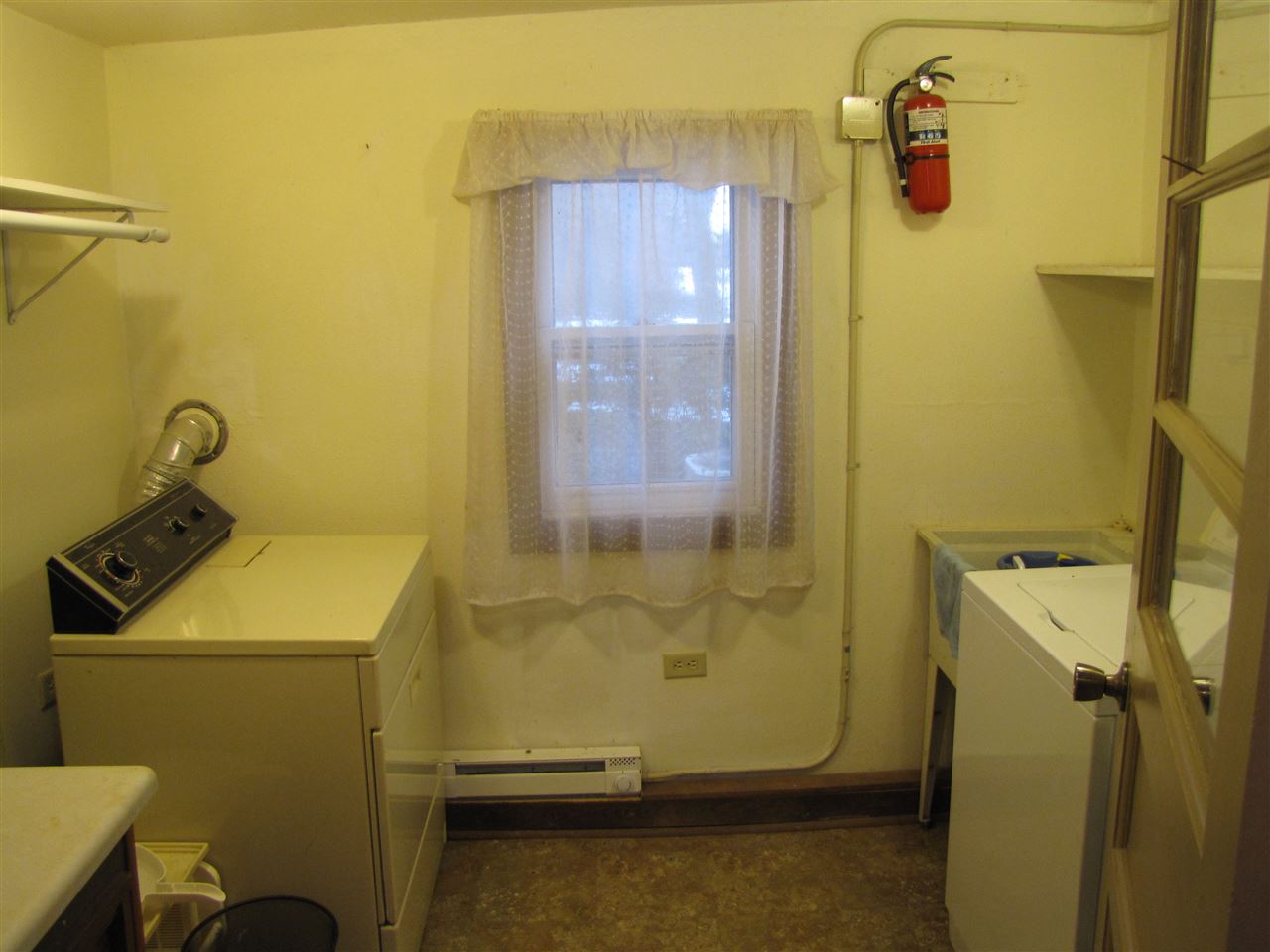 3634 Rotary Road Rockford, IL 61109 - Photo 15 of 18 a bathroom with a sink and mirror