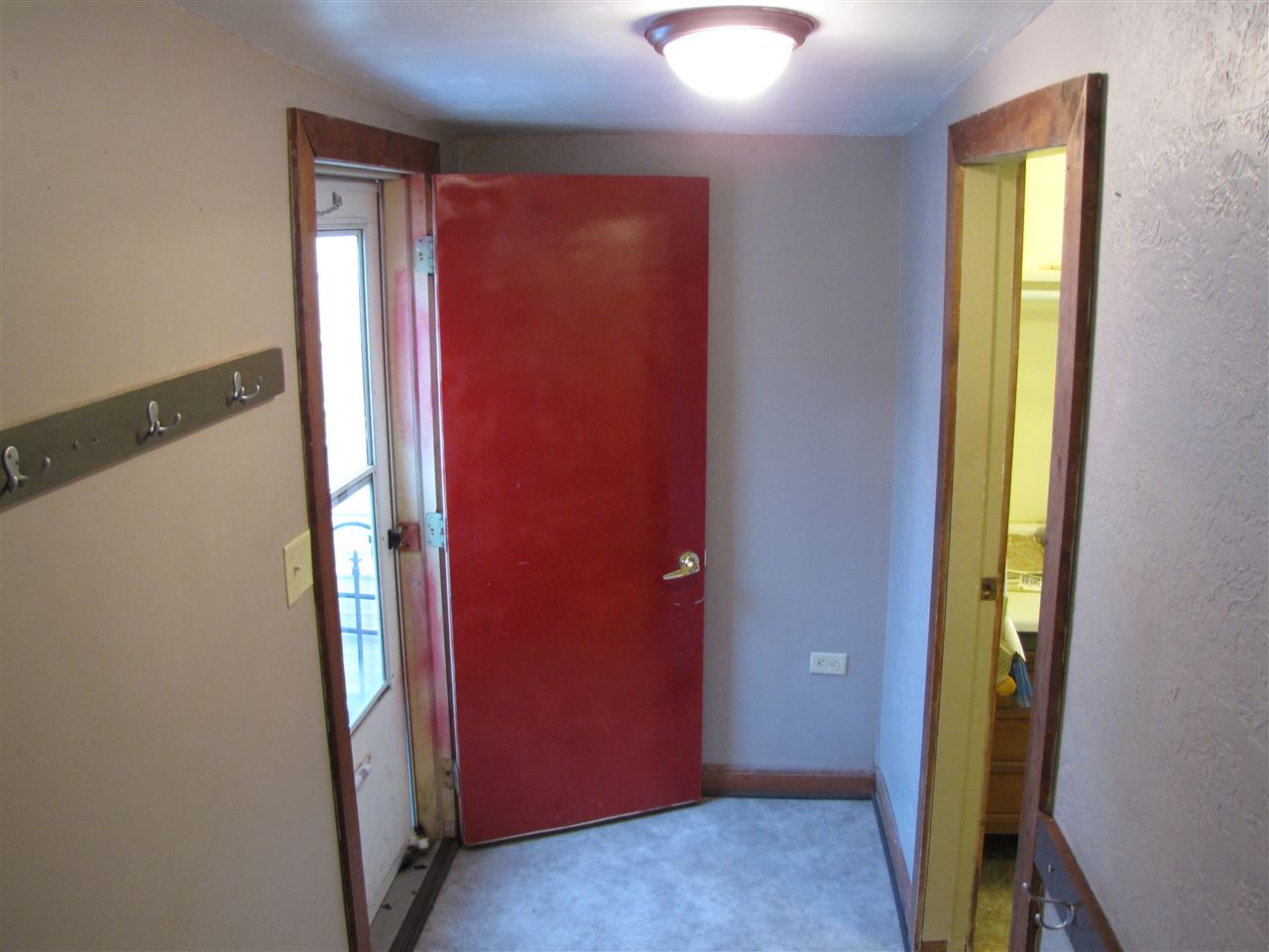3634 Rotary Road Rockford, IL 61109 - Photo 16 of 18 a view of a bathroom with a glass door and a window