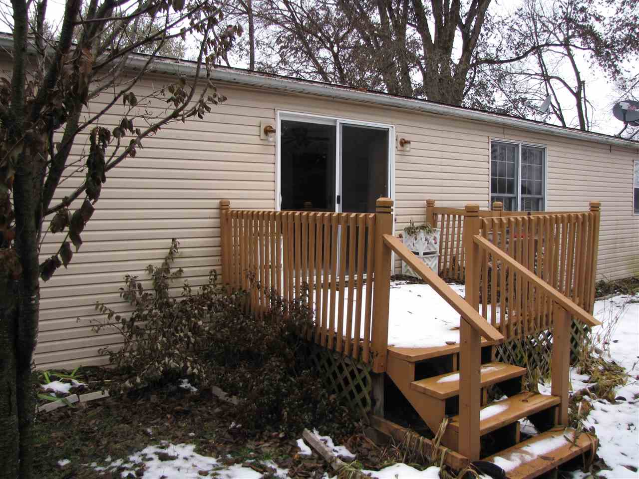 3634 Rotary Road Rockford, IL 61109 - Photo 2 of 18 a view of a house with backyard and wooden deck