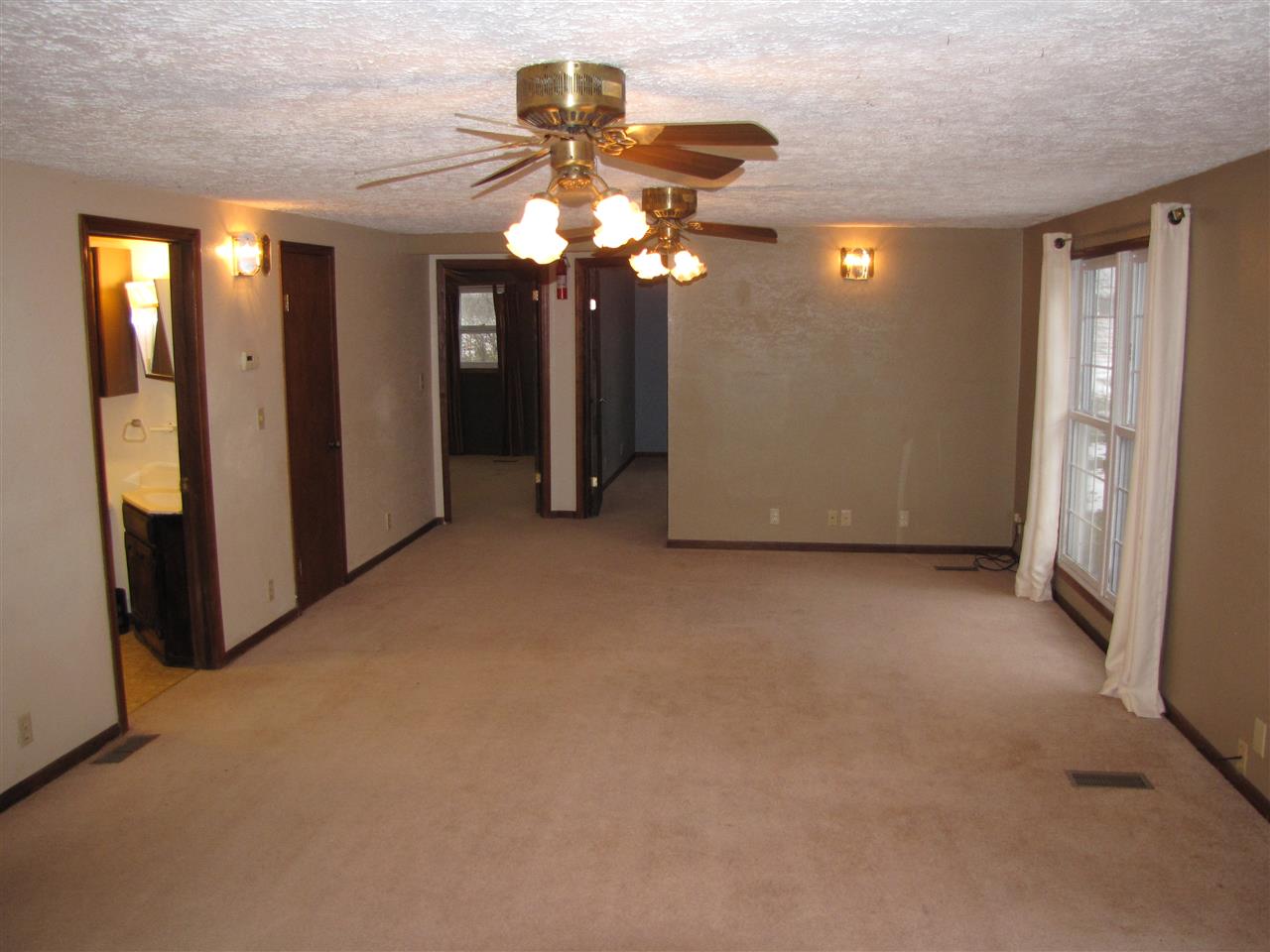 3634 Rotary Road Rockford, IL 61109 - Photo 6 of 18 a view of an empty room with a window