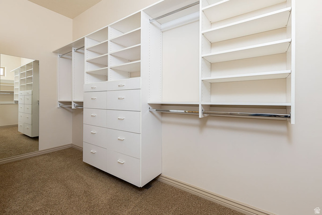 888 East Fiddlers Canyon Road Cedar City, UT 84721 - Photo 35 of 74 Walk in closet featuring dark carpet