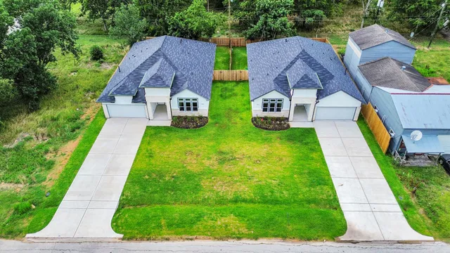 a aerial view of a house with garden