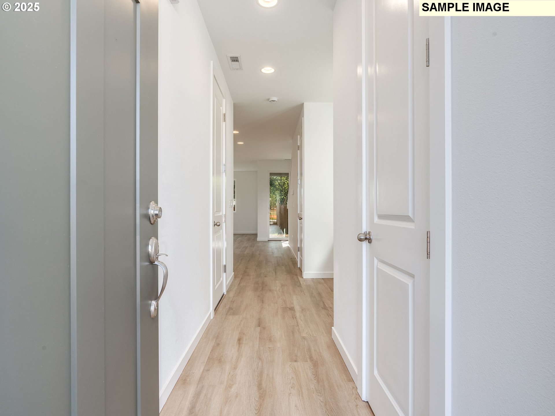 2307 Southwest 5th Circle Battle Ground, WA 98604 - Photo 2 of 21 a view of a hallway with wooden floor