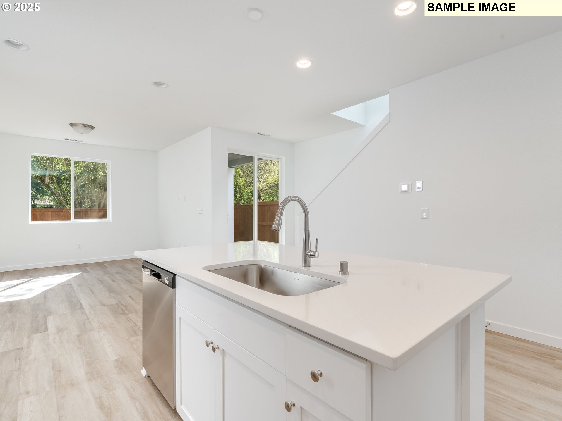 2307 Southwest 5th Circle Battle Ground, WA 98604 - Photo 7 of 21 a kitchen with a sink a counter top space and a window