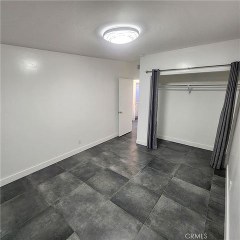 a outdoor view of a building with sitting area