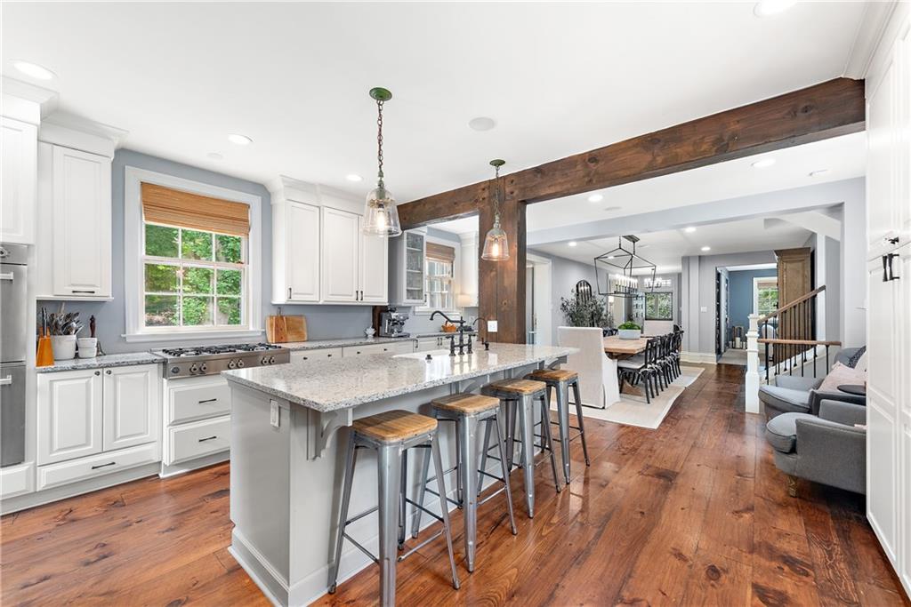 607 Davis Lane Sewickley, PA 15143 - Photo 16 of 43 a kitchen with lots of counter top space and dining table