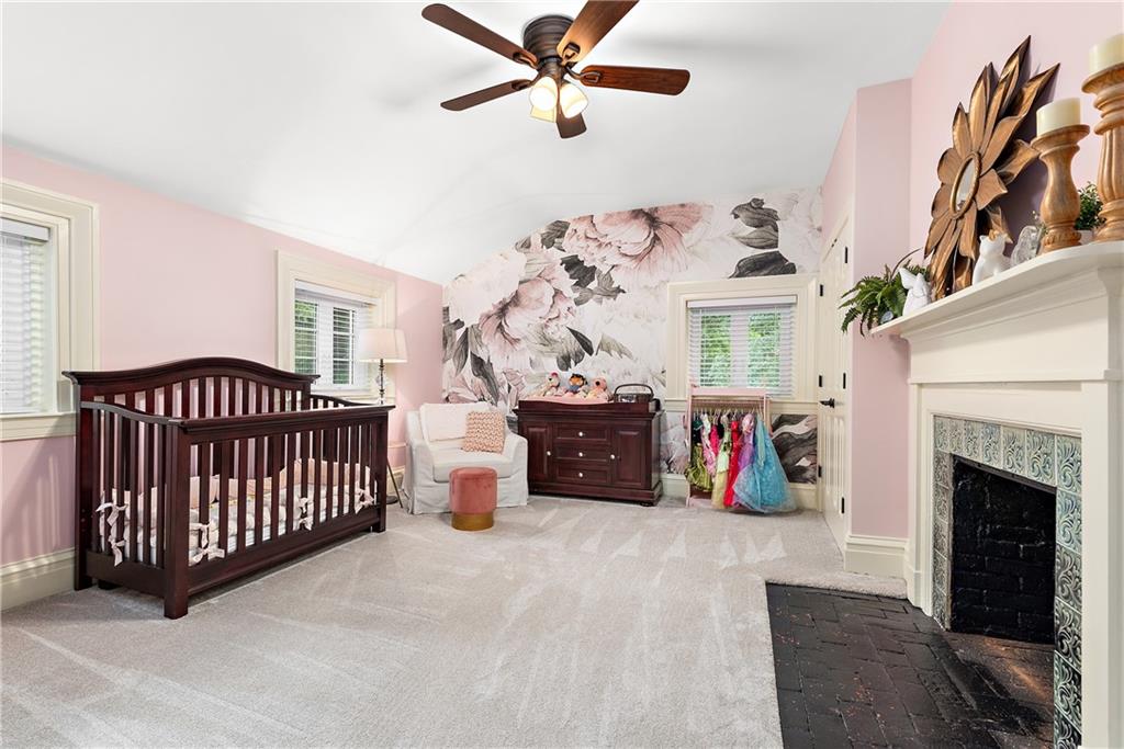 607 Davis Lane Sewickley, PA 15143 - Photo 25 of 43 a bedroom with furniture and a chandelier