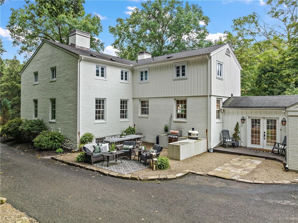 607 Davis Lane Sewickley, PA 15143 - Photo 32 of 43 a view of a house with a patio