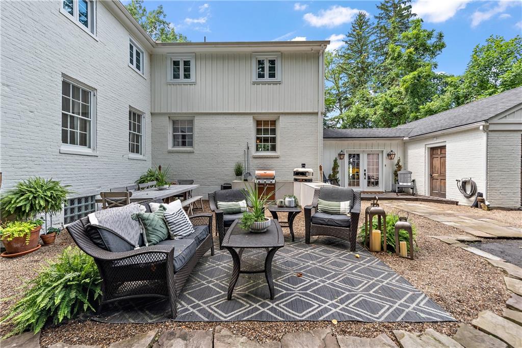 607 Davis Lane Sewickley, PA 15143 - Photo 33 of 43 a view of a patio with couches and potted plants