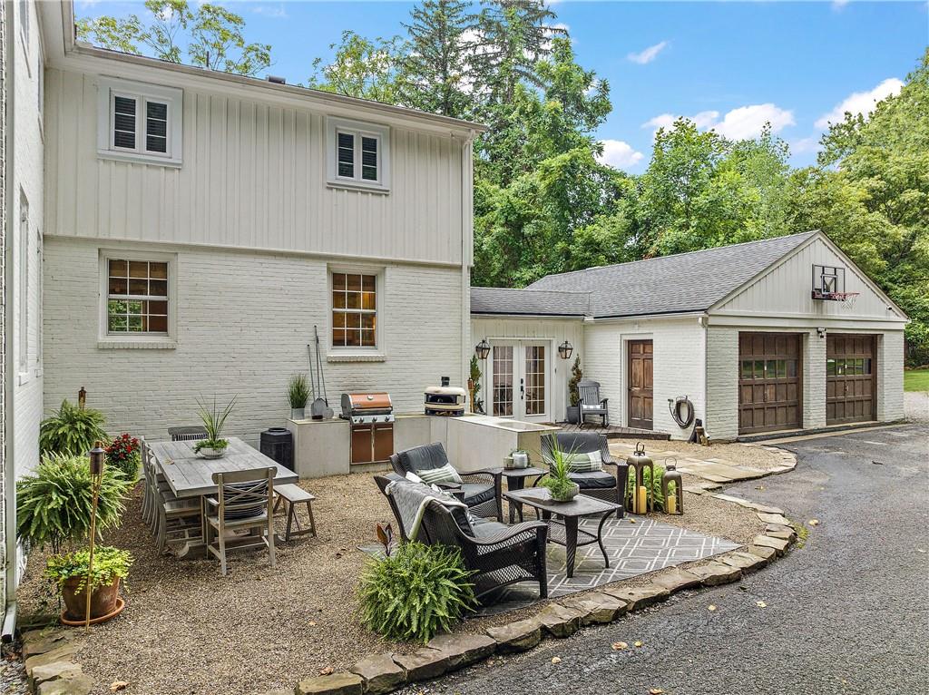 607 Davis Lane Sewickley, PA 15143 - Photo 34 of 43 a view of a house with patio
