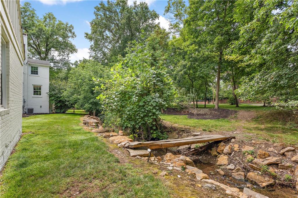 607 Davis Lane Sewickley, PA 15143 - Photo 37 of 43 a view of a backyard with large trees