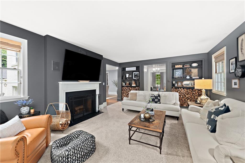 607 Davis Lane Sewickley, PA 15143 - Photo 5 of 43 a living room with furniture fireplace and window