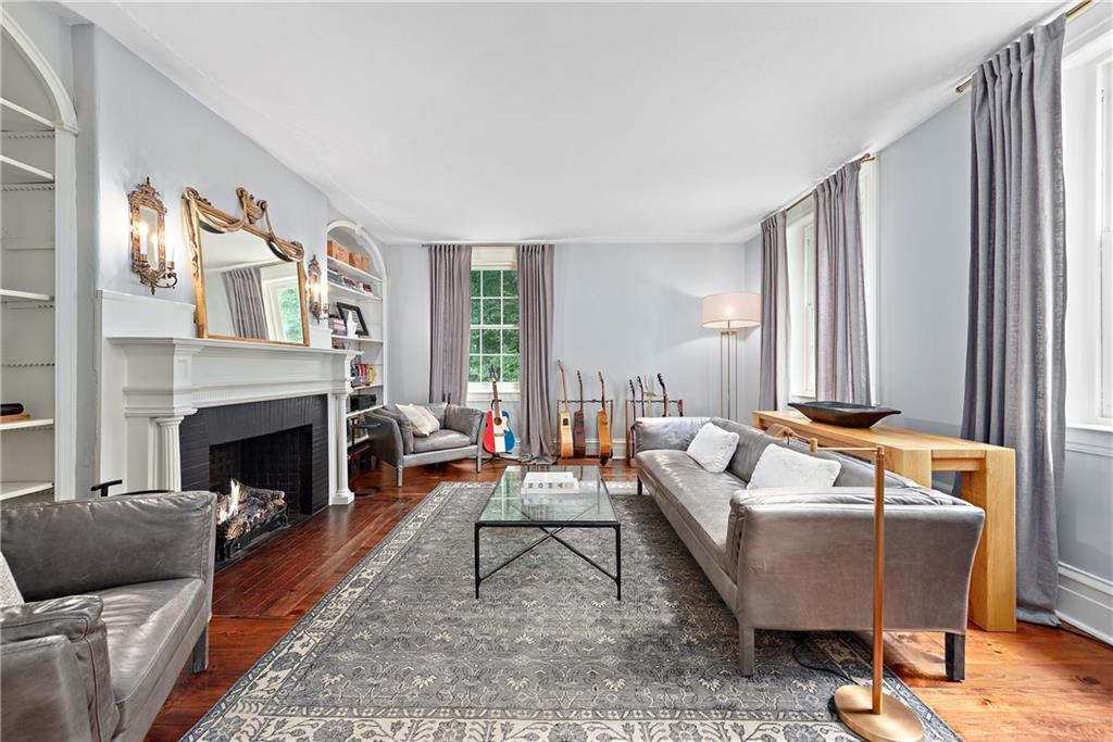 607 Davis Lane Sewickley, PA 15143 - Photo 6 of 43 a living room with furniture and a fireplace