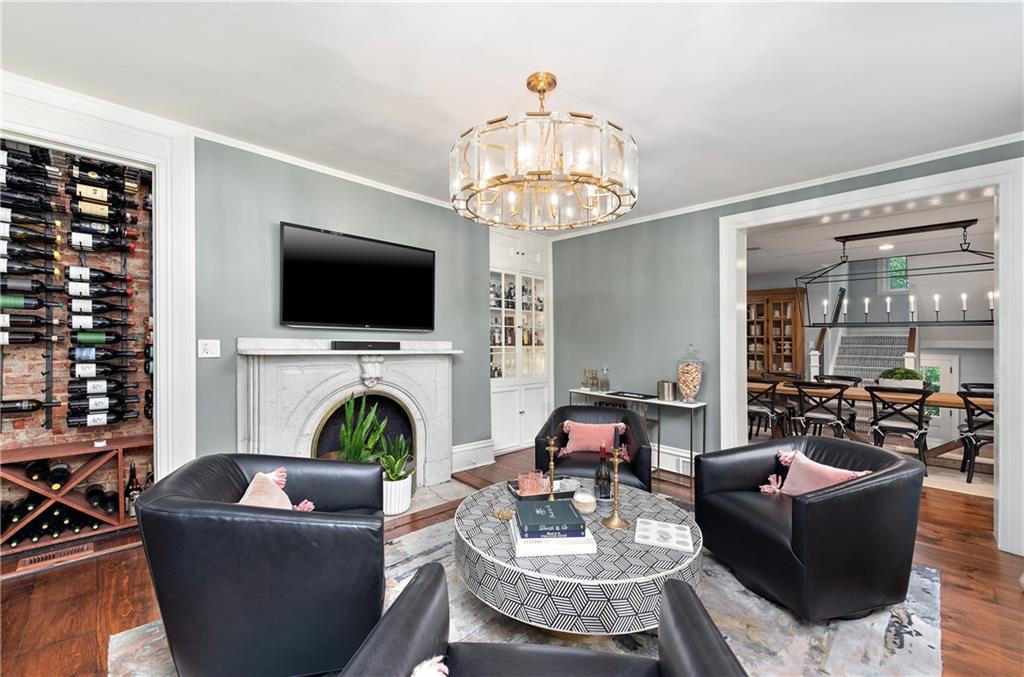 607 Davis Lane Sewickley, PA 15143 - Photo 9 of 43 a living room with fireplace furniture and a flat screen tv