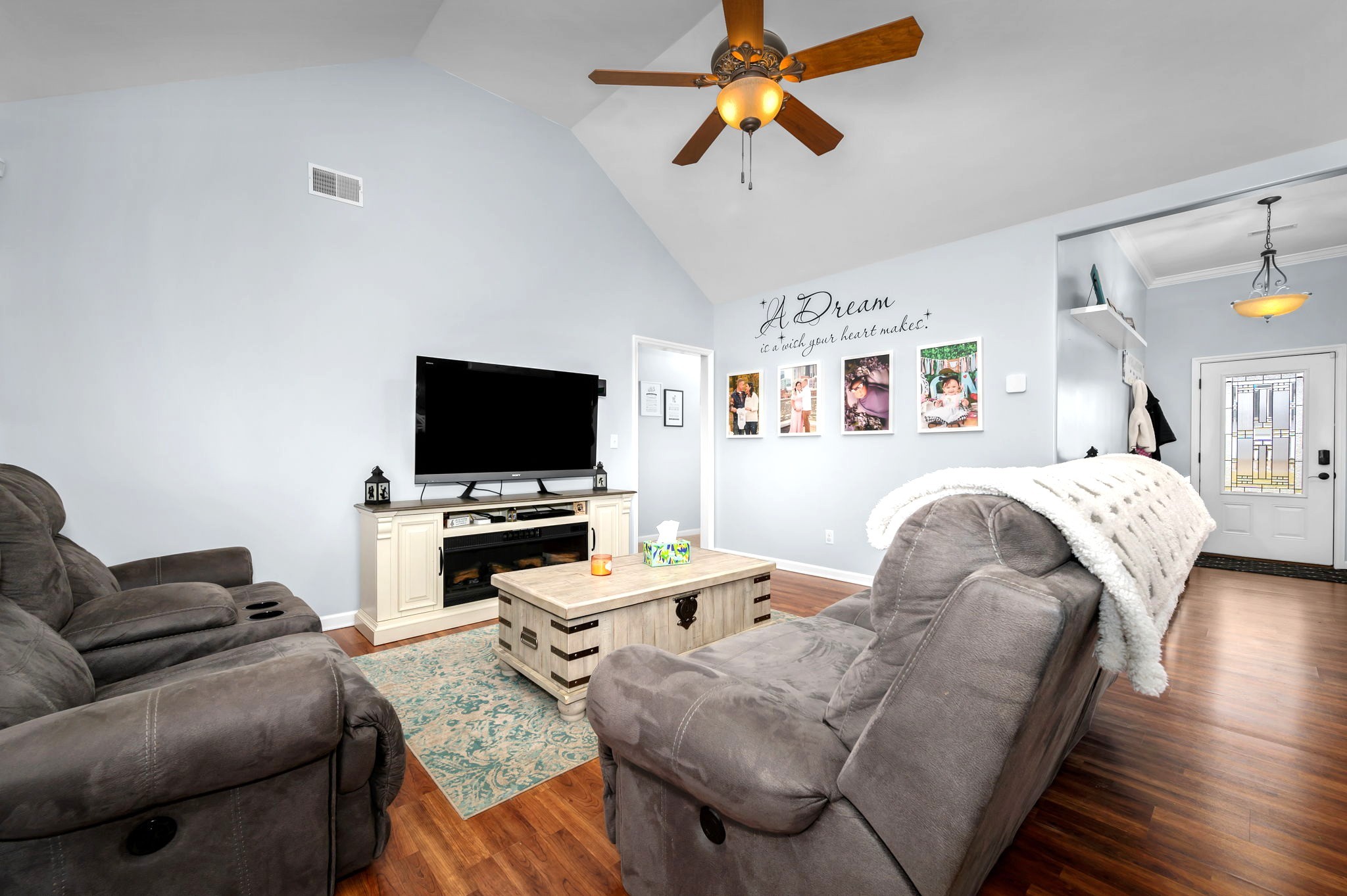4232 Zephyr Court Murfreesboro, TN 37128 - Photo 4 of 26 a living room with furniture and a flat screen tv