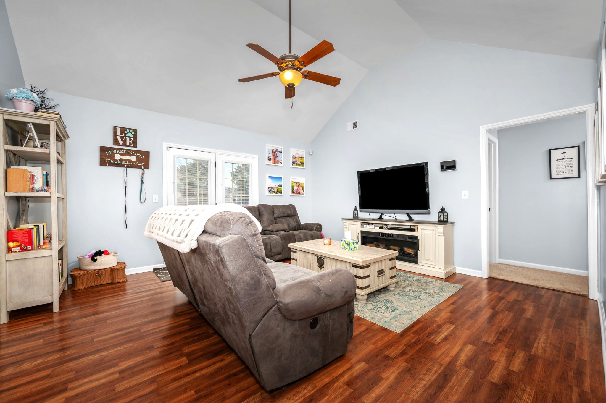 4232 Zephyr Court Murfreesboro, TN 37128 - Photo 6 of 26 a living room with furniture and a flat screen tv