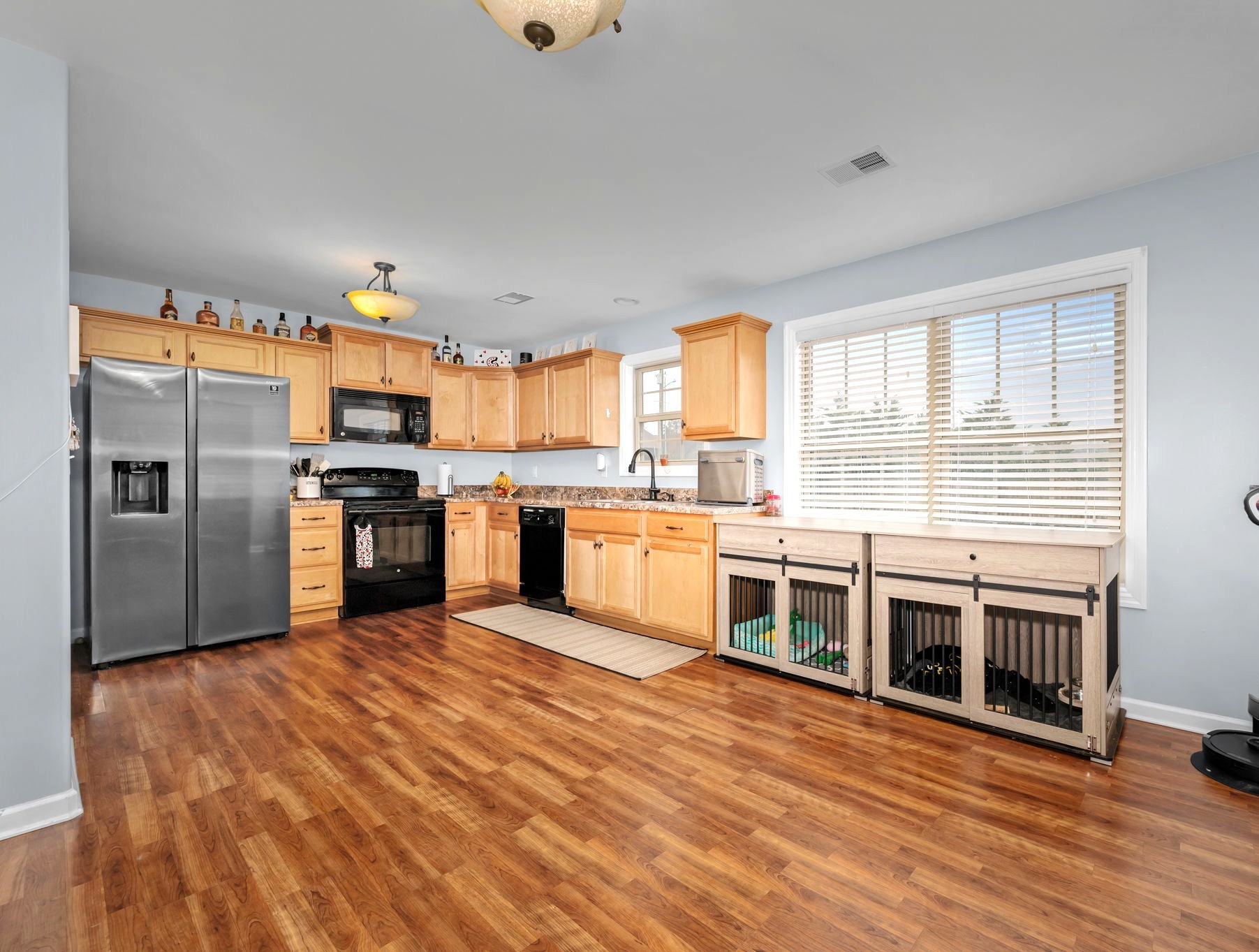 4232 Zephyr Court Murfreesboro, TN 37128 - Photo 7 of 26 a kitchen with stainless steel appliances granite countertop a stove and a refrigerator