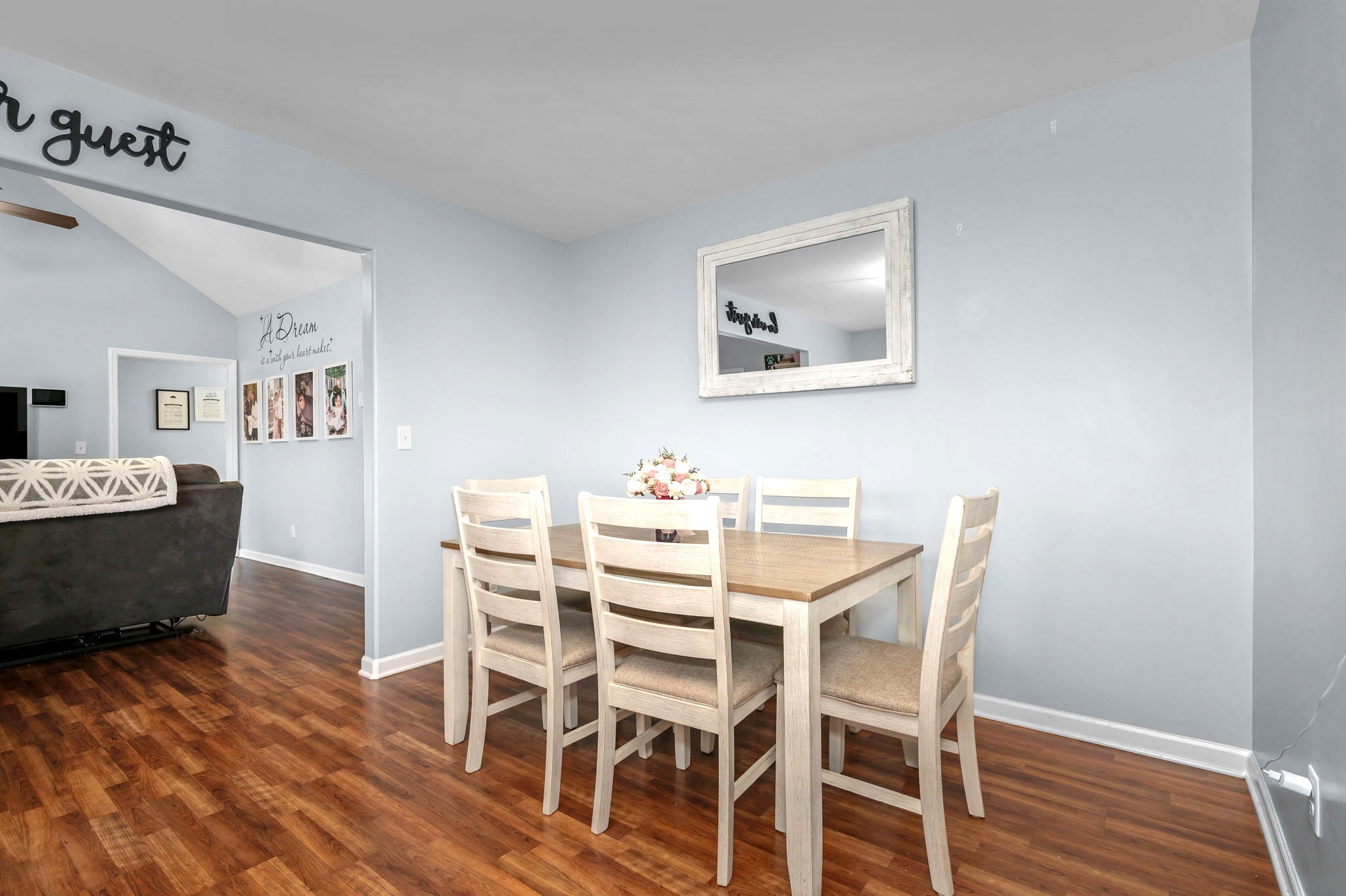 4232 Zephyr Court Murfreesboro, TN 37128 - Photo 10 of 26 a view of a dining room with furniture and wooden floor