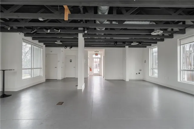 a view of a room with wooden walls