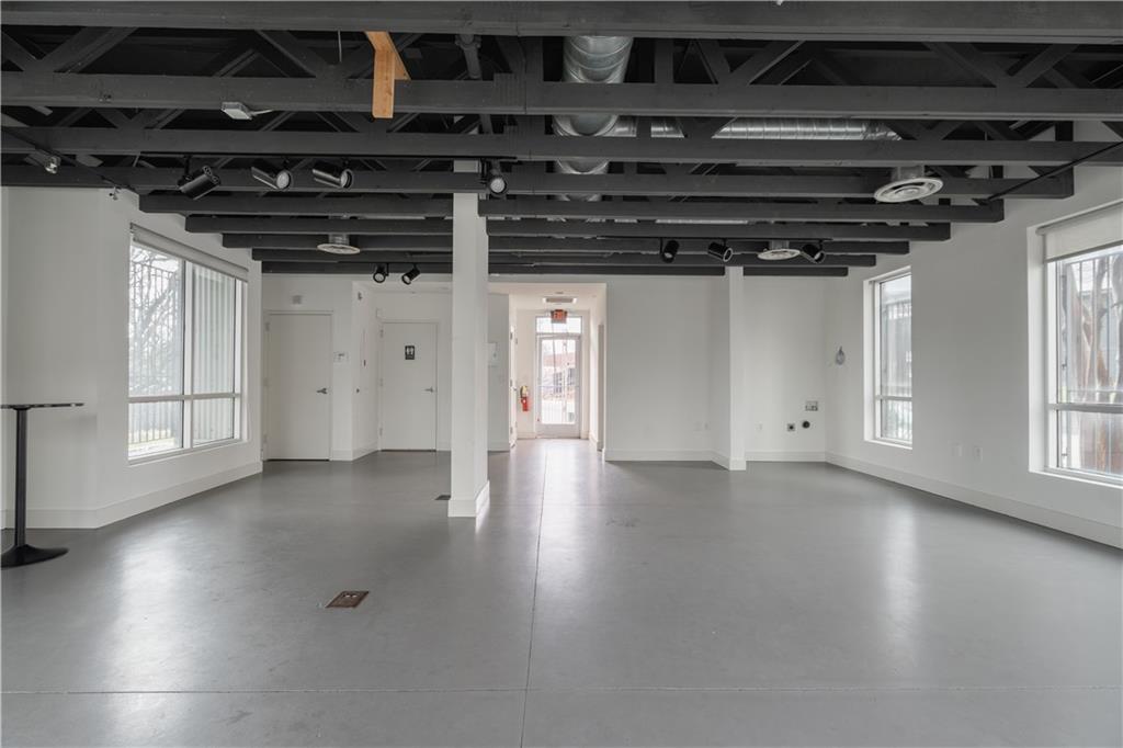 692 10th Street Northwest Atlanta, GA 30318 - Photo 3 of 38 a view of a room with wooden walls