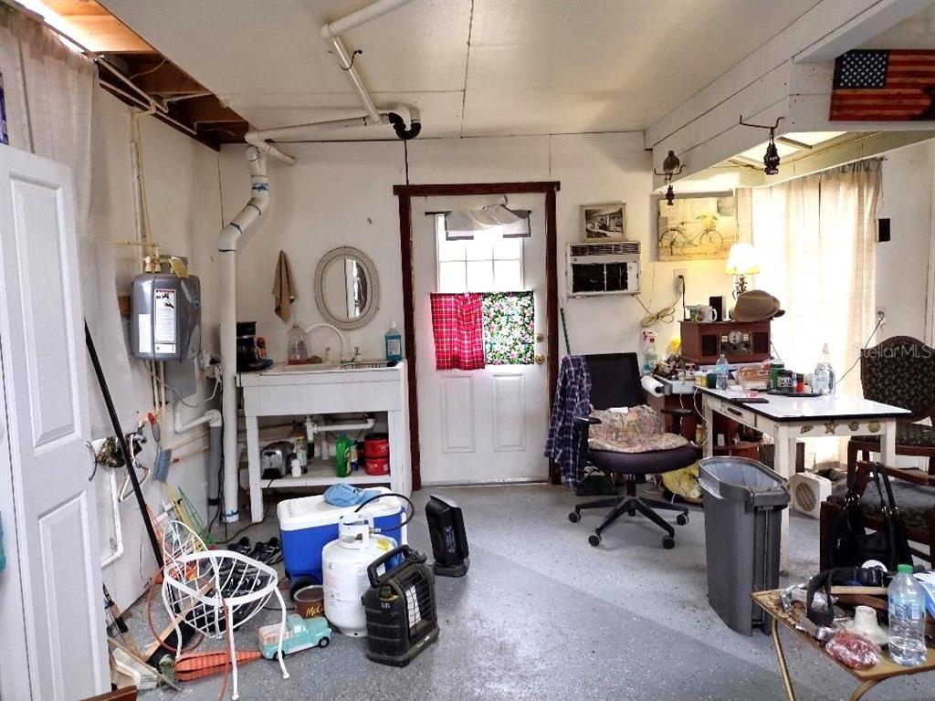 1568 Hazelnut Street Bunnell, FL 32110 - Photo 13 of 19 a view of a livingroom with furniture and a window