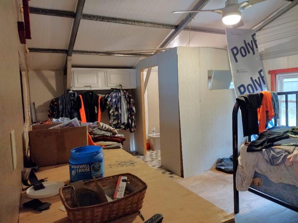 1568 Hazelnut Street Bunnell, FL 32110 - Photo 15 of 19 a view of a room with gym equipment