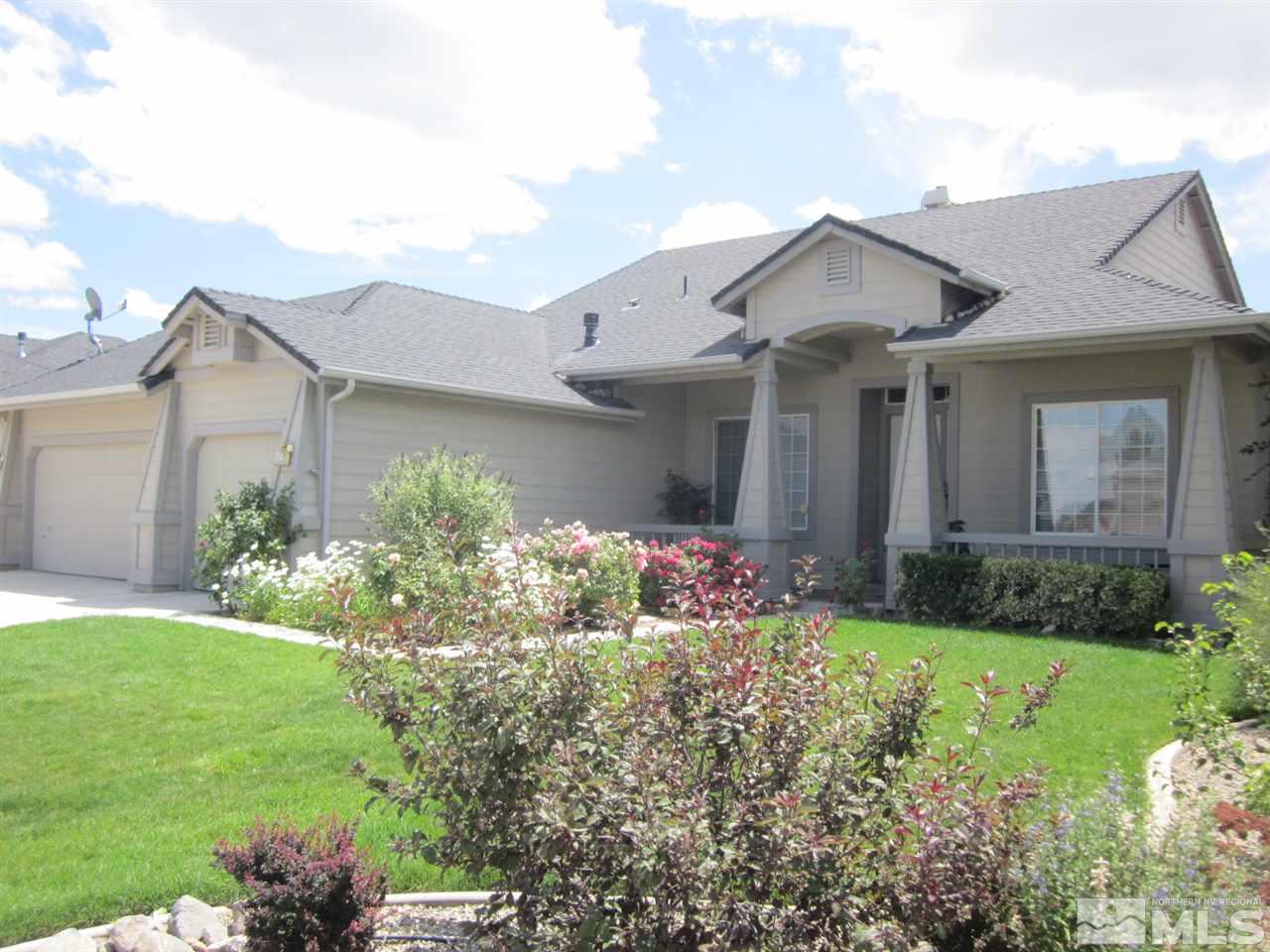 742 Silver Run Drive Reno, NV 89521 - Photo 1 of 1 a front view of a house with a yard