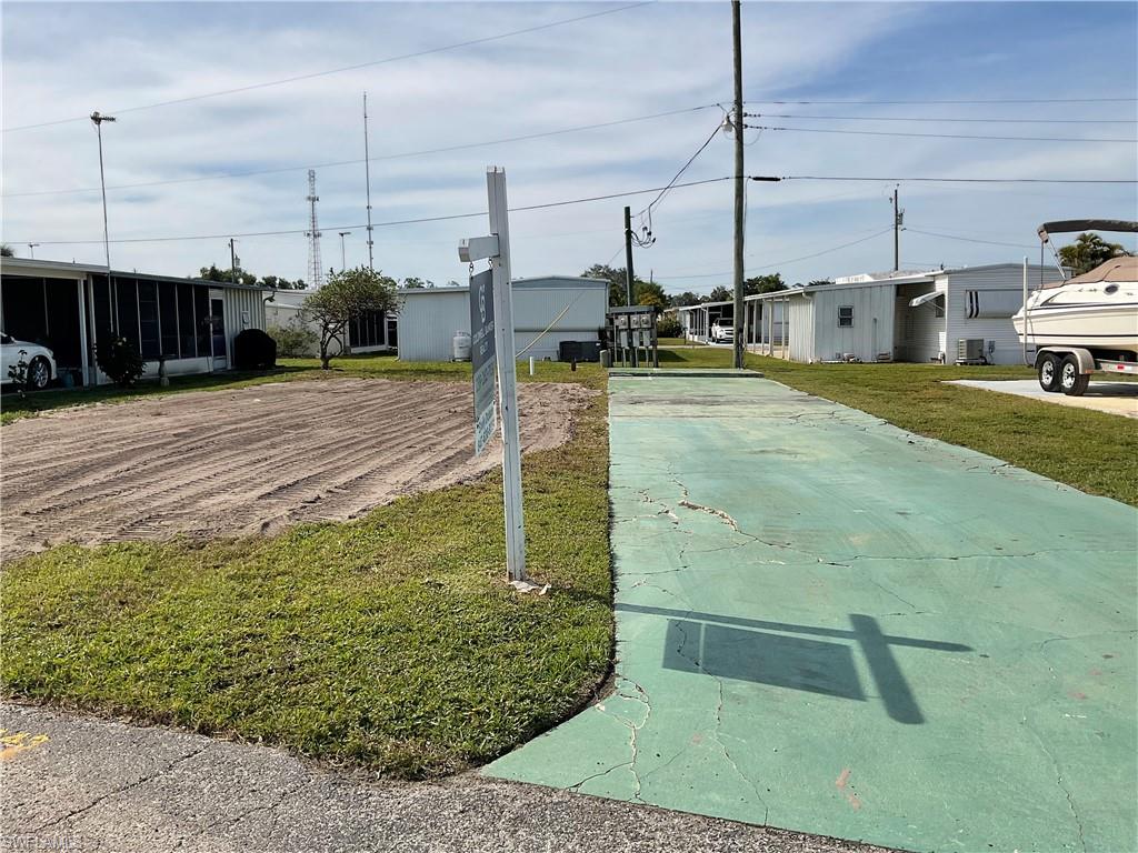 143 Rose Lane Naples, FL 34114 - Photo 5 of 13 a view of a swimming pool