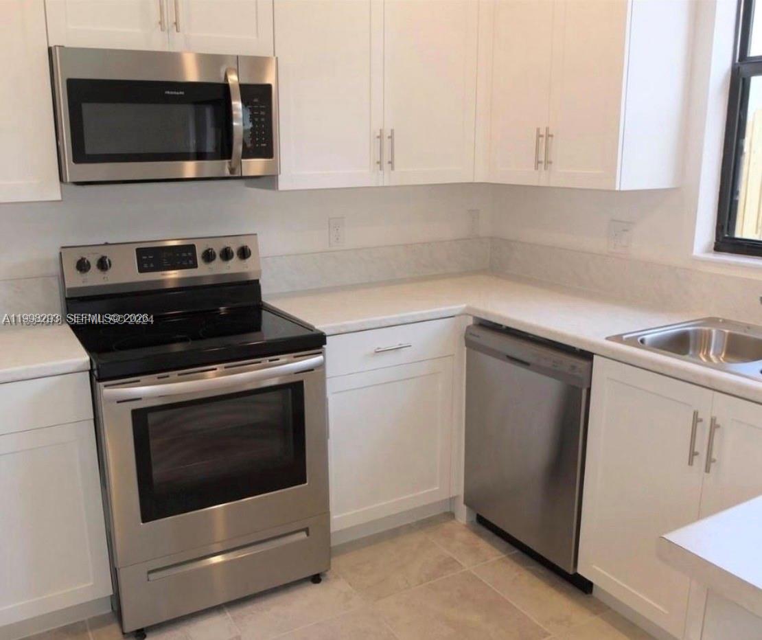 407 Northeast 208th Terrace Miami, FL 33179 - Photo 2 of 7