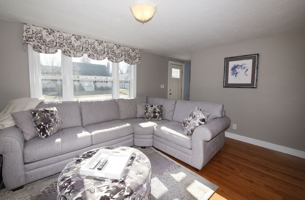 106 Rinaldo Road Weymouth, MA 02191 - Photo 12 of 39 a living room with furniture and a large window