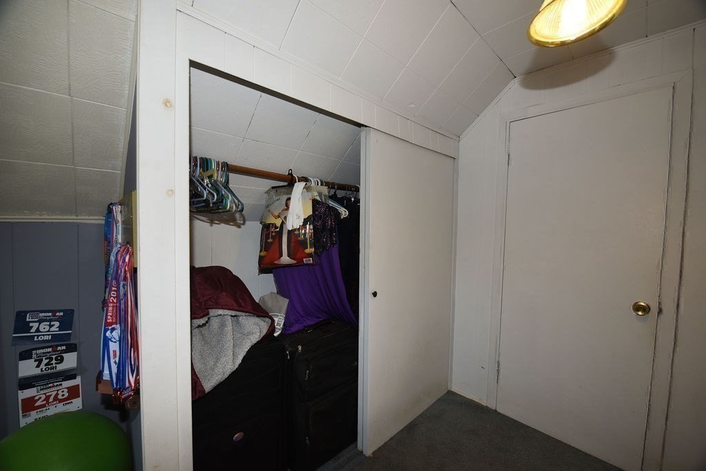 106 Rinaldo Road Weymouth, MA 02191 - Photo 24 of 39 a view of walk in closet with clothes and shoes