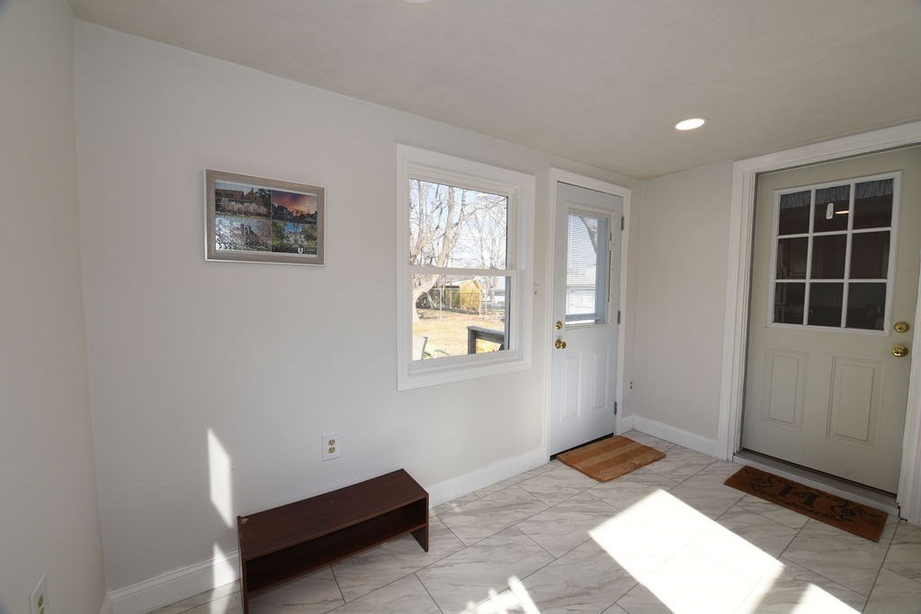 106 Rinaldo Road Weymouth, MA 02191 - Photo 4 of 39 a bedroom with bed and window