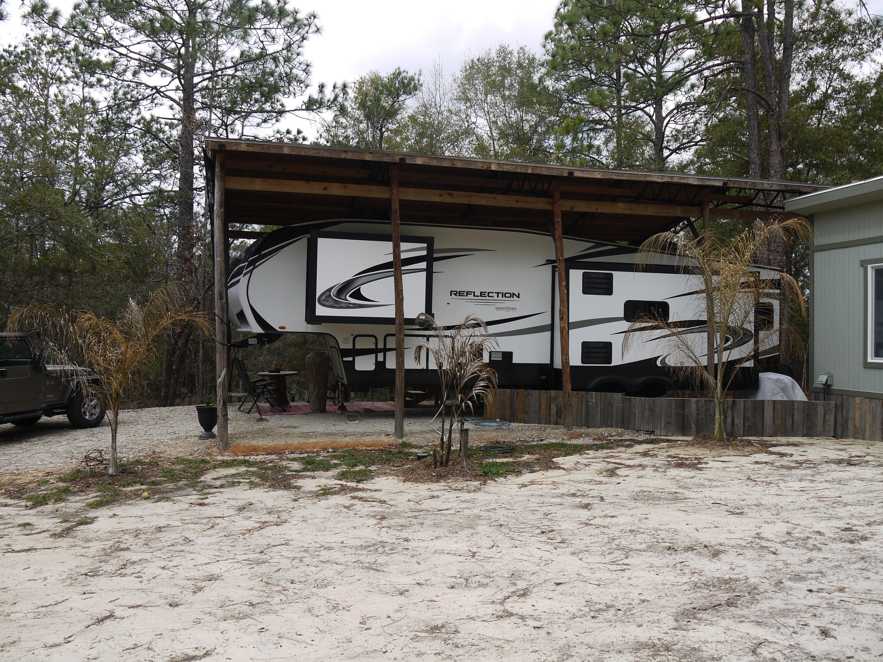 4449 Yellow Bluff Road Crestview, FL 32539 - Photo 24 of 42 a view of house with wooden fence