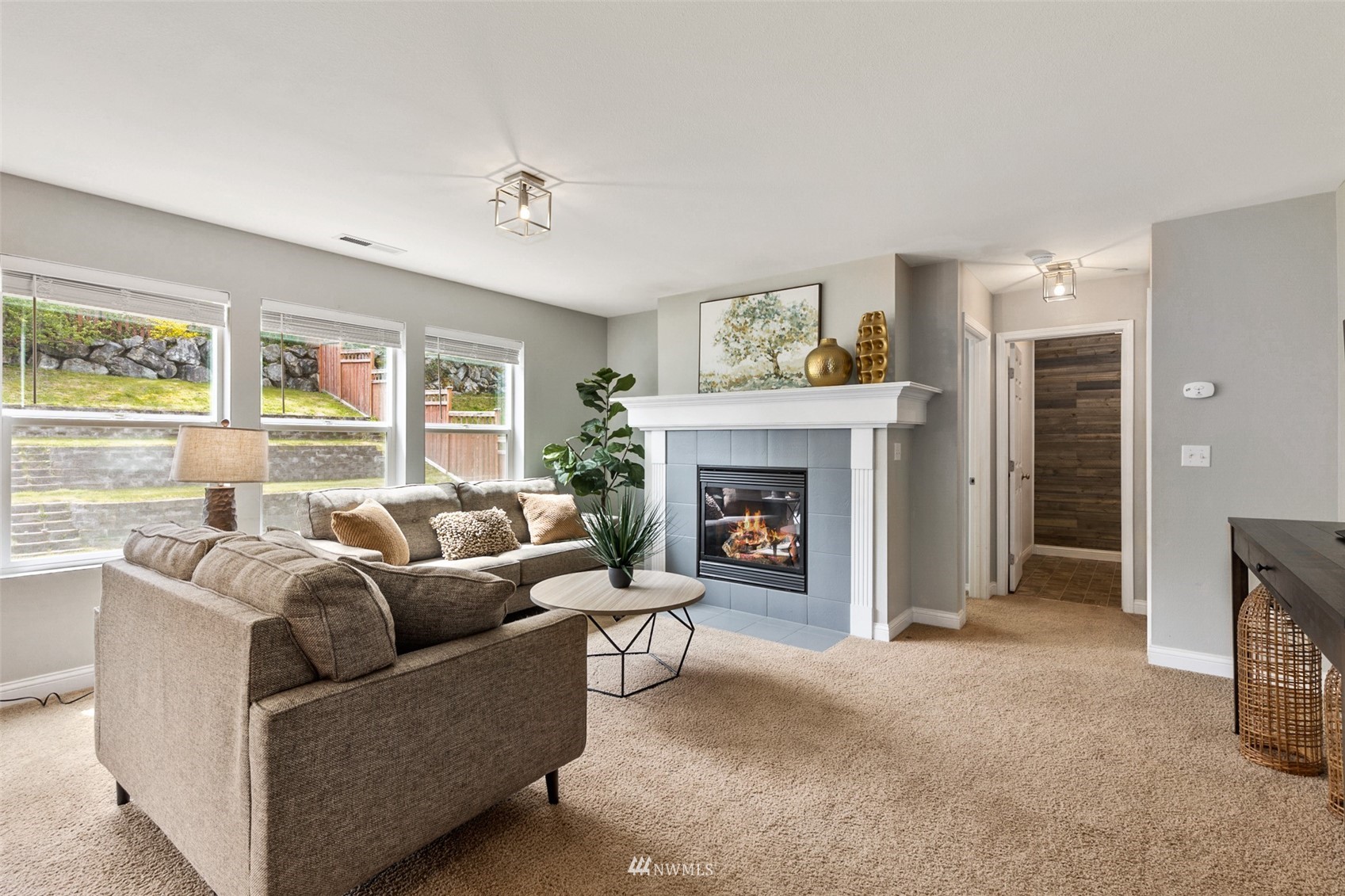 1360 Foreman Road DuPont, WA 98327 - Photo 11 of 33 a living room with furniture and a fireplace