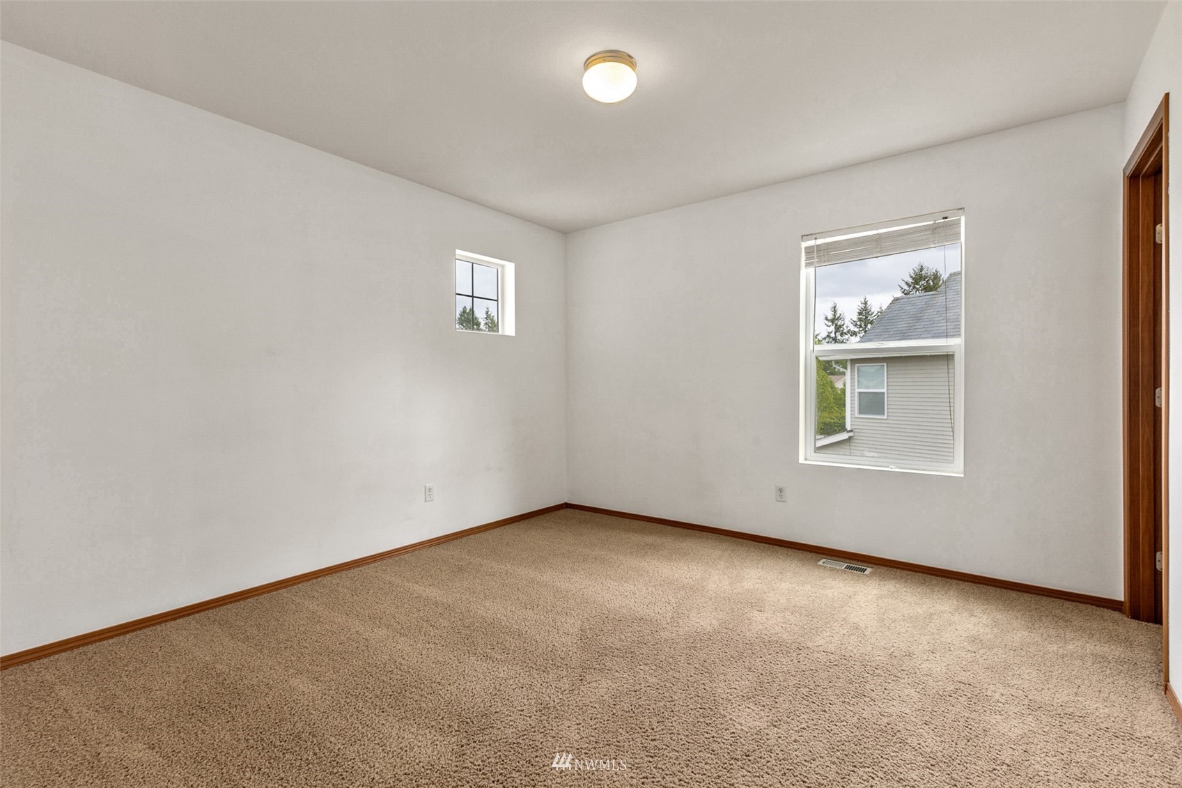 1360 Foreman Road DuPont, WA 98327 - Photo 21 of 33 an empty room with windows
