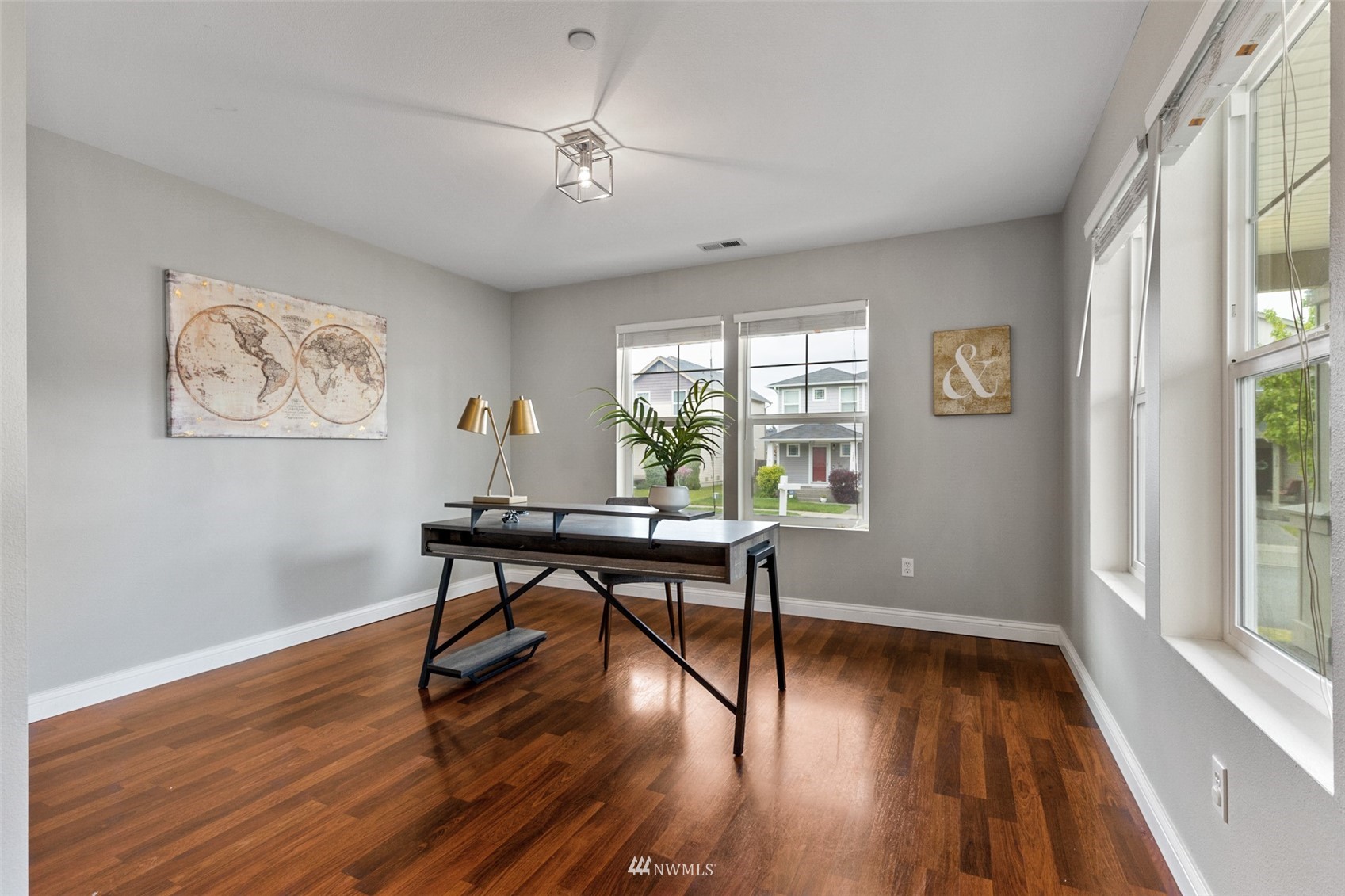 1360 Foreman Road DuPont, WA 98327 - Photo 3 of 33 a view of a workspace with furniture window and wooden floor