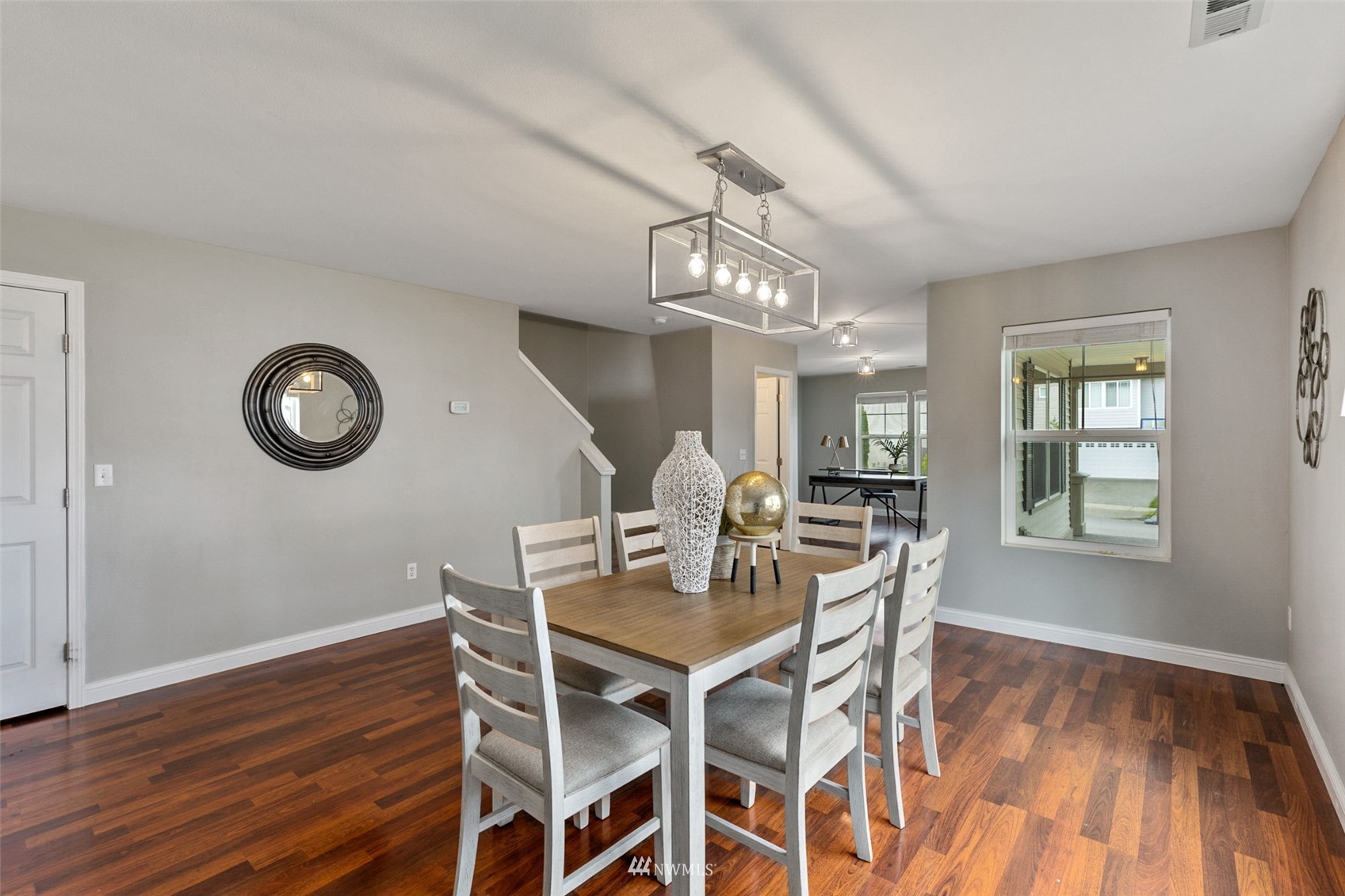 1360 Foreman Road DuPont, WA 98327 - Photo 5 of 33 a view of a dining room with furniture and chandelier