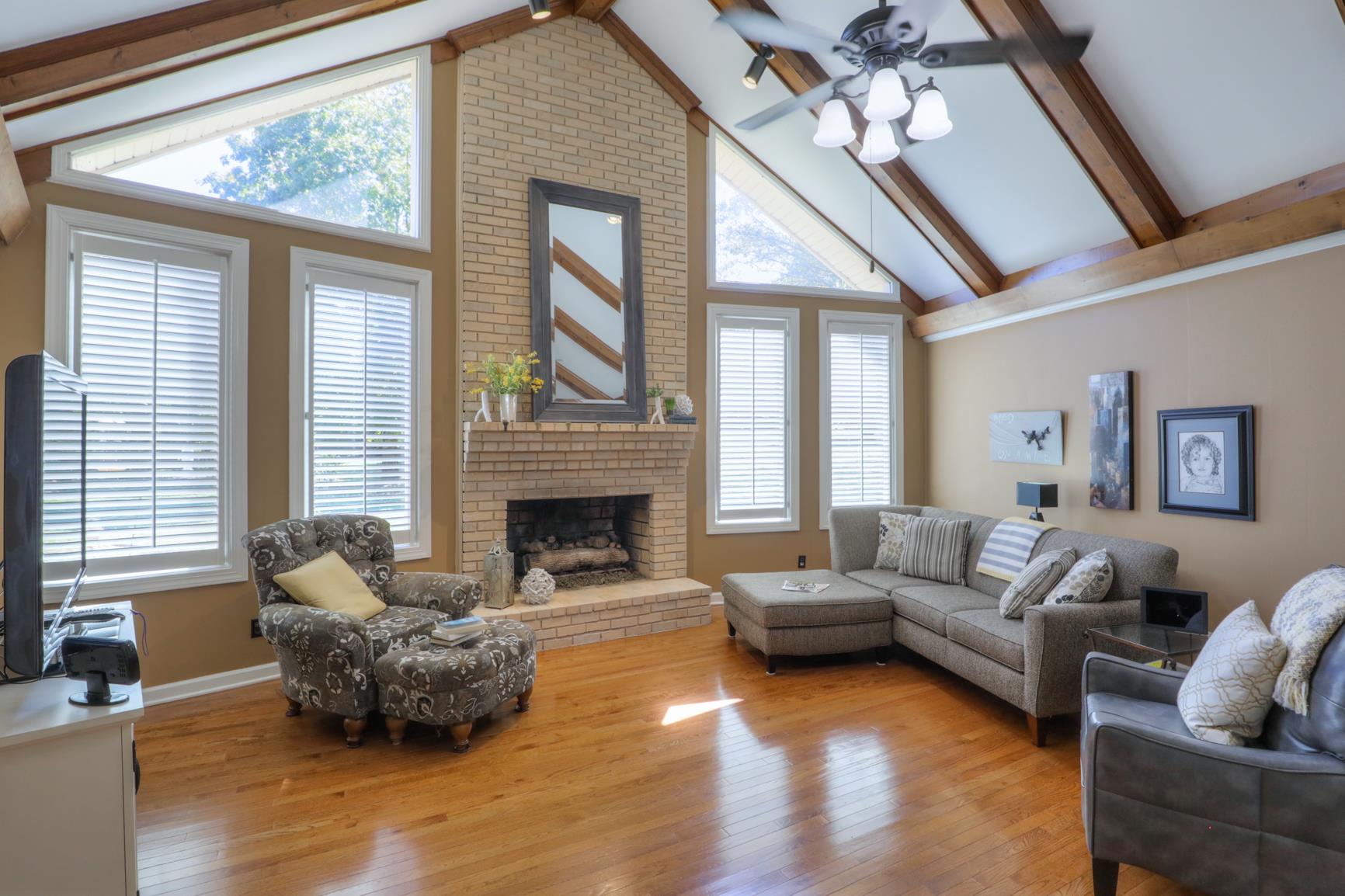 416 Rolling Mill Road Old Hickory, TN 37138 - Photo 9 of 30 Statement wall of floor to ceiling fireplace and windows.