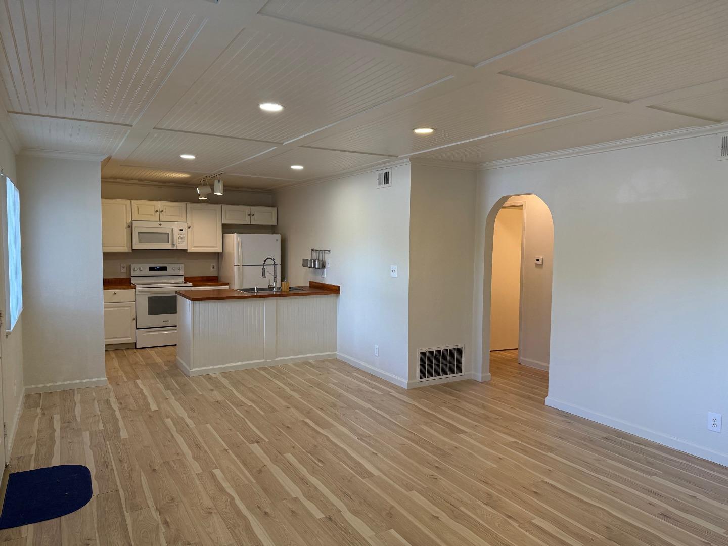 2505 Prescott Road, Unit 1 Modesto, CA 95350 - Photo 7 of 42 a view of kitchen with wooden floor